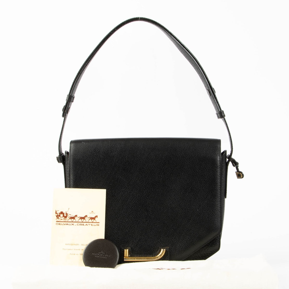 Authentic pre-loved Delvaux Black Leather Scala Shoulder Bag on Labellov.com
