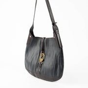 Authentic pre-loved Delvaux Purple Toile de Cuir Treille Shoulder Bag on Labellov.com