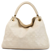 shop 100% authentic second hand Louis Vuitton Neige Monogram Empreinte Artsy MM Bag on Labellov.com