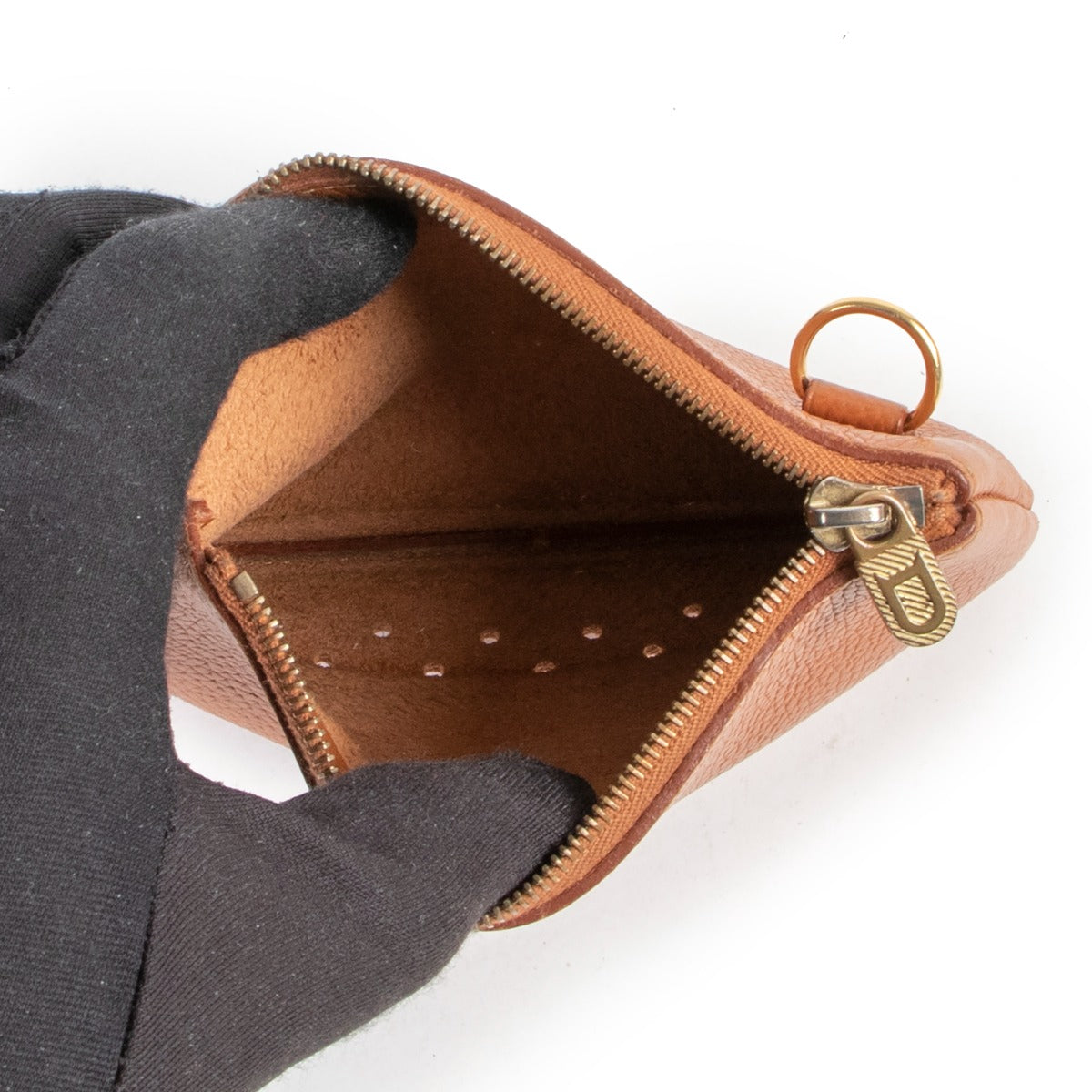 Buy and sell your designer items for a reasonable price. Get this Delvaux Cognac Pouch now at Labellov, 100% authenticity guaranteed.