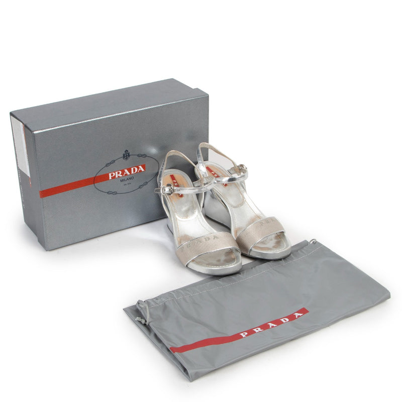 Buy and sell your designer items at Labellov. Get these Prada Silver Wedge Heels - Size 37 at Labellov Luxury online or come by in our showroom with excellent service.