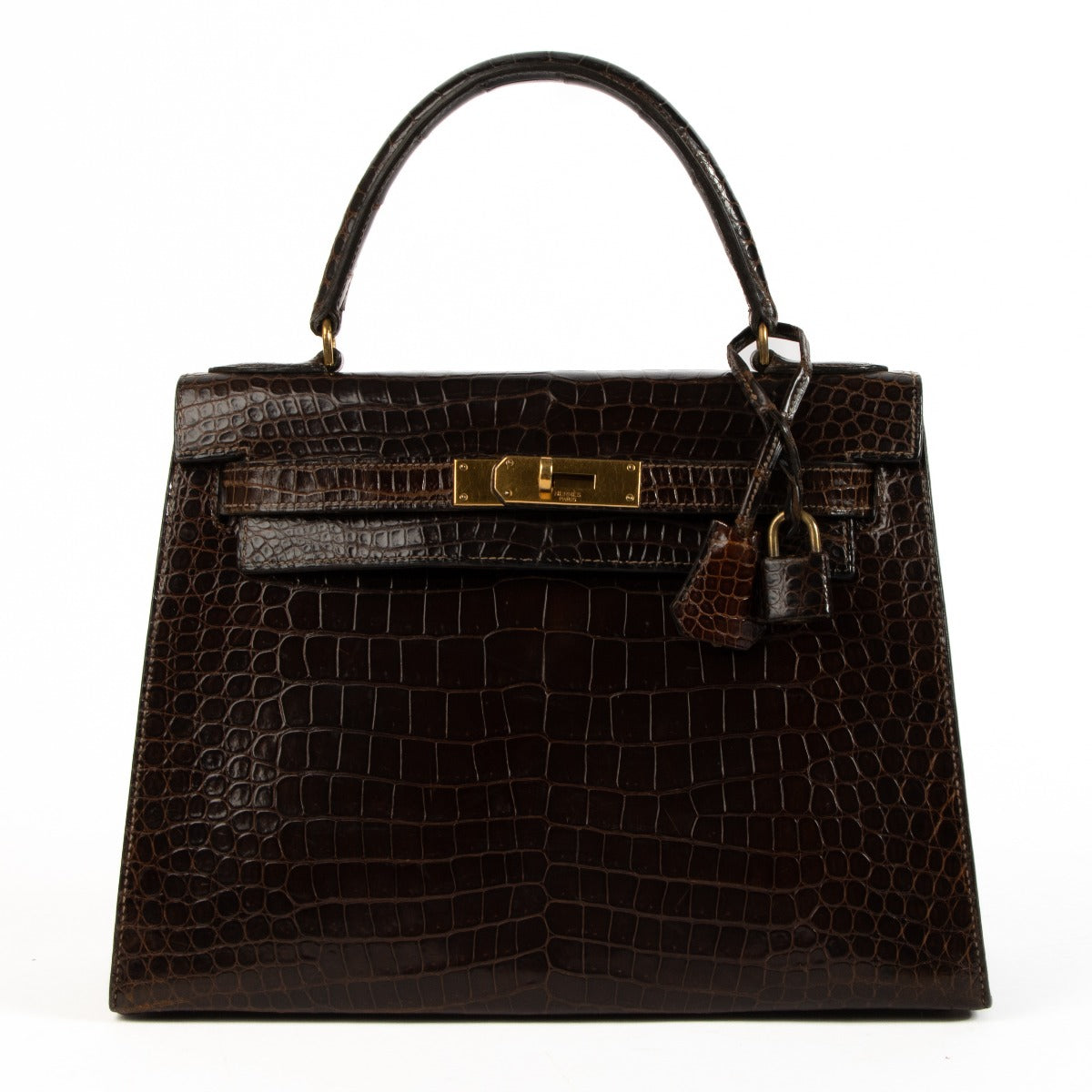 Authhentic second hand Hermès Vintage 1970s Kelly 28 Brown Shiny Porosus Crocodile on www.labellov.com