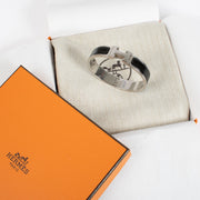 Shop the authentic Hermès Clic H PM Bracelet in black enamel with palladium hardware at Labellov