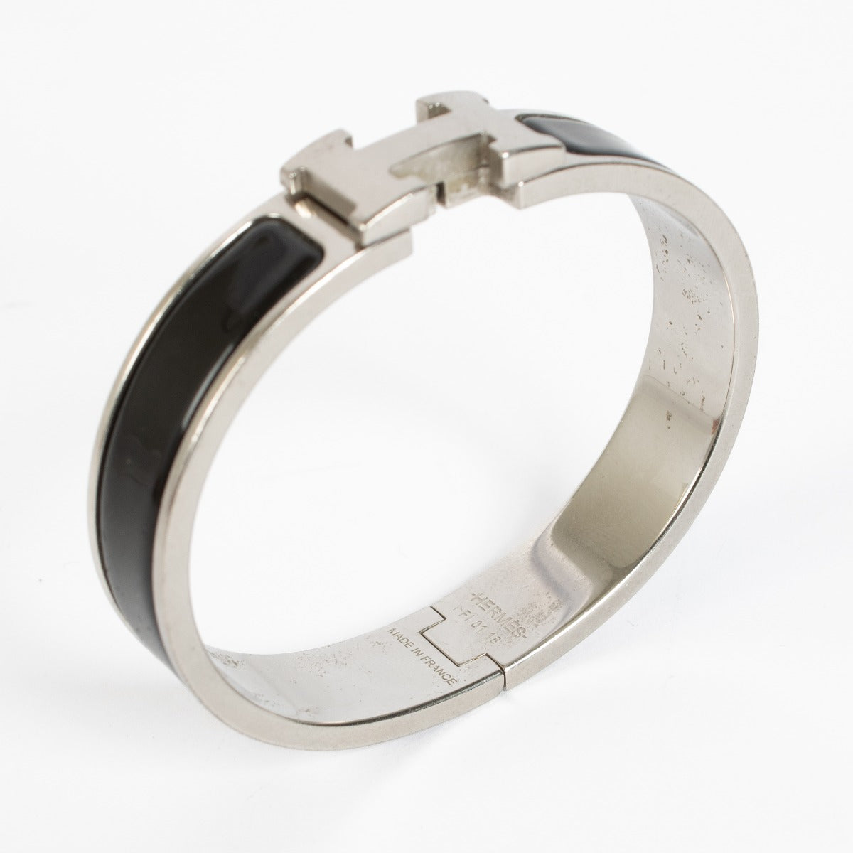 Shop the authentic Hermès Clic H PM Bracelet in black enamel with palladium hardware at Labellov
