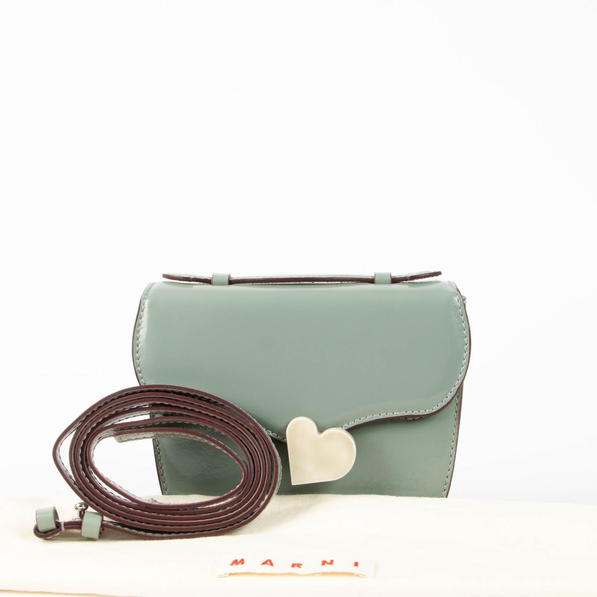Authentic pre-loved Marni Grey Heart Lock Crossbody Bag on Labellov.com