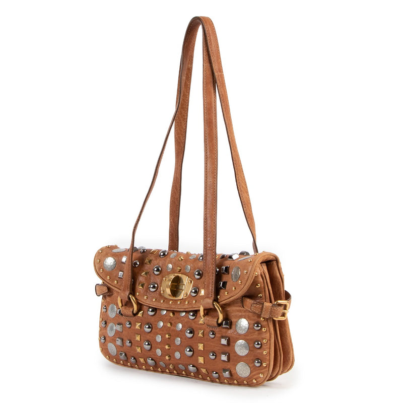 Buy online an authentic second hand Miu Miu Brown Leather Studded Shoulder Bag in very good condition at Labellov in Antwerp.
