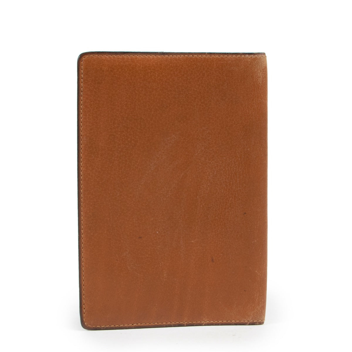 Online website in brown leather wallet by Delvaux with gold D initial
