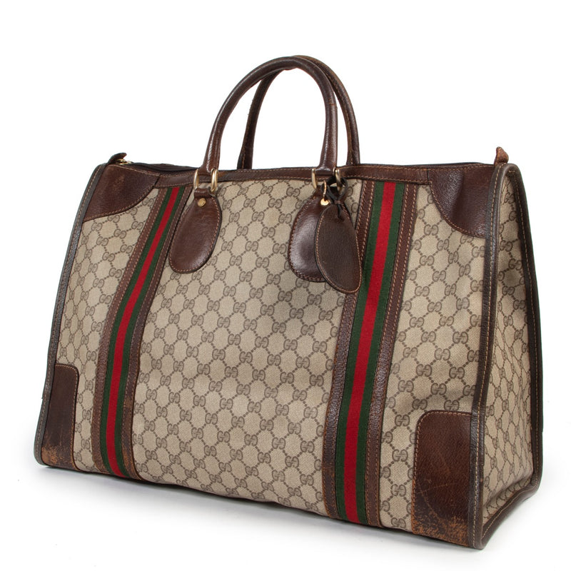 Original Gucci Monogram Travel Bag shop online on a safe website for vintage designer items by Labellov. Very good condition designer bag on Labellov. Unique preloved product in very good quality on Labellov Luxury Designer items.