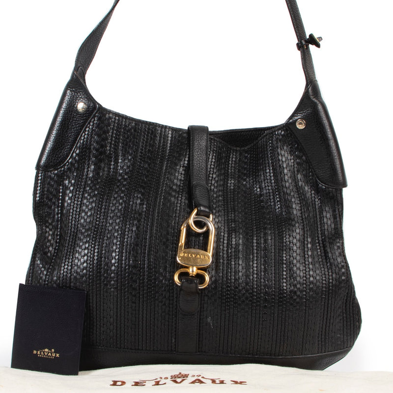 Original vintage Delvaux Black Toile De Cuir Shoulder bag in good condition with spacious interior and in good quality only on Labellov Luxury designer site