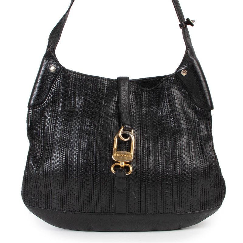 Original vintage Delvaux Black Toile De Cuir Shoulder bag in good condition with spacious interior and in good quality only on Labellov Luxury designer site