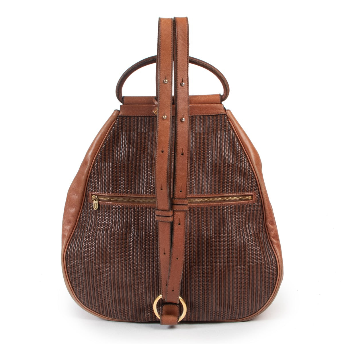 Koop authentieke tweedehands Delvaux bruin lederen handtas met juiste prijs. Achetez un authentique sac Delvaux en cuir Brun d'occasion au juste prix. Buy authentic second hand Delvaux Cognac Toile De Cuir Backpack bag at the right price.