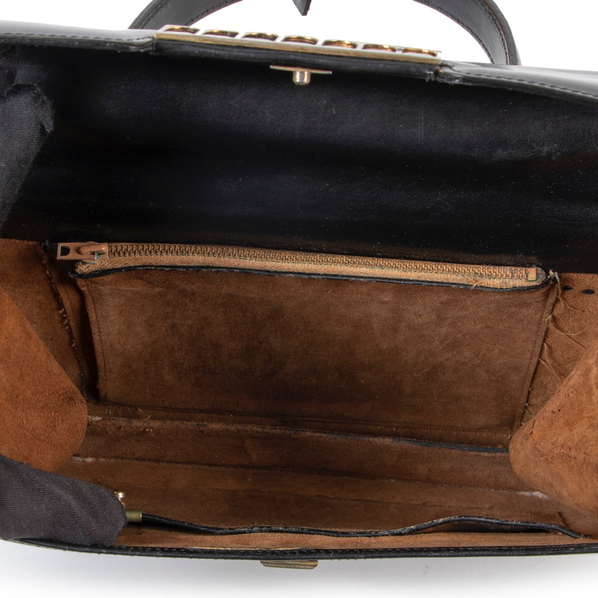 Buy this Delvaux Vintage Black Top handle if you are a vintage lover for a reasonable price at Labellov Antwerp online or in store.