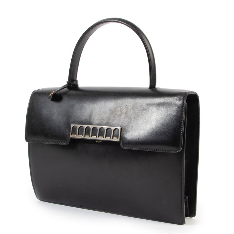 Buy this Delvaux Vintage Black Top handle if you are a vintage lover for a reasonable price at Labellov Antwerp online or in store.