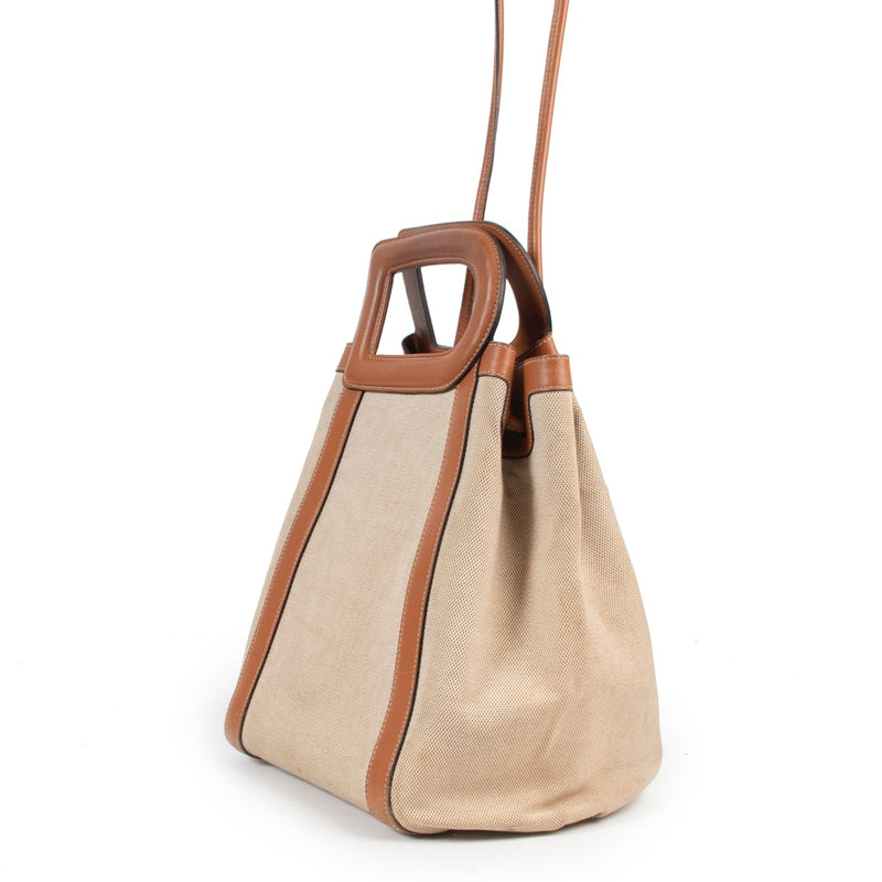Shop safe online 100% authentic second hand Delvaux Camel Canvas Caraibes Shoulder Bag in very good condition at the right price at Labellov in Antwerp.