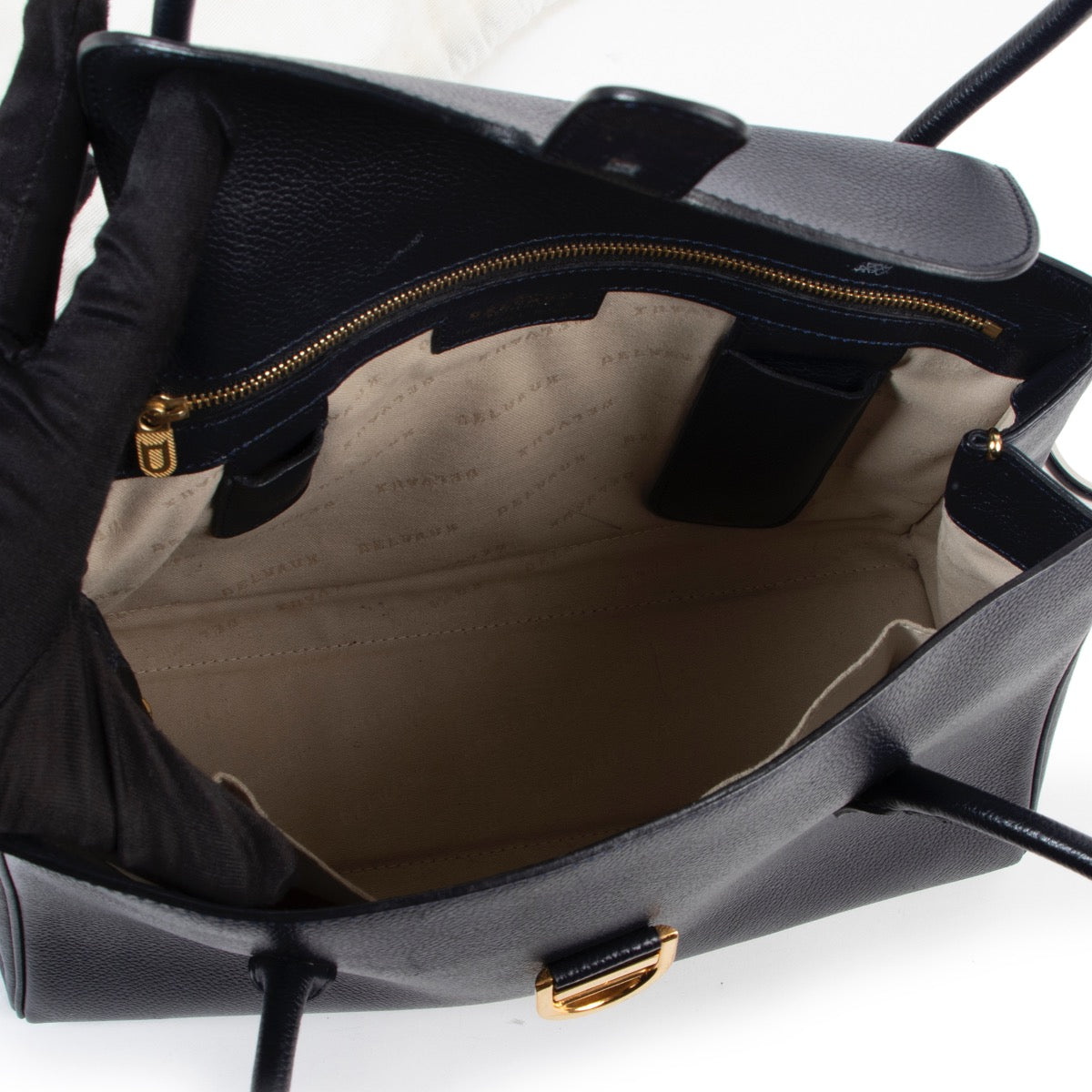 Shop safe online 100% authentic second hand Delvaux Dark Blue Cabriolet PM Shoulder Bag at the right price at Labellov in Antwerp.