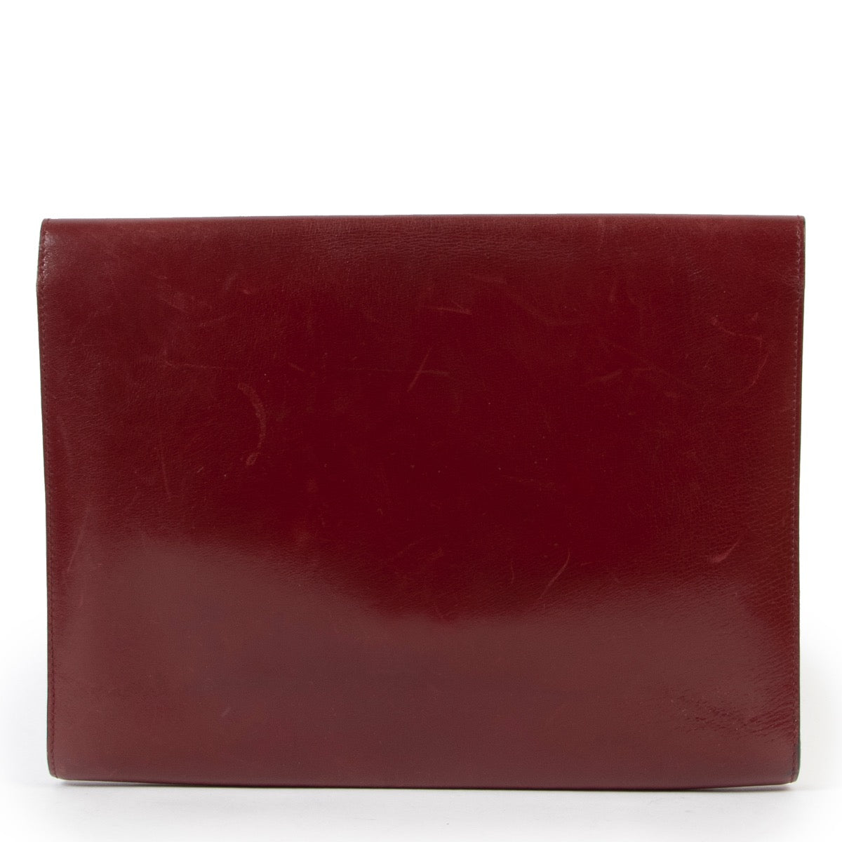 Original vintage 2nd hand Delvaux Burgundy Leather Clutch in good condition on Labellov website now for sale