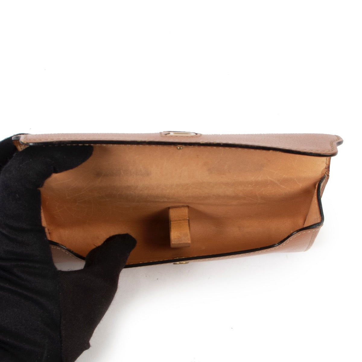 This Delvaux Cognac Sunglass Case is available at Labellov online or in store in Antwerp