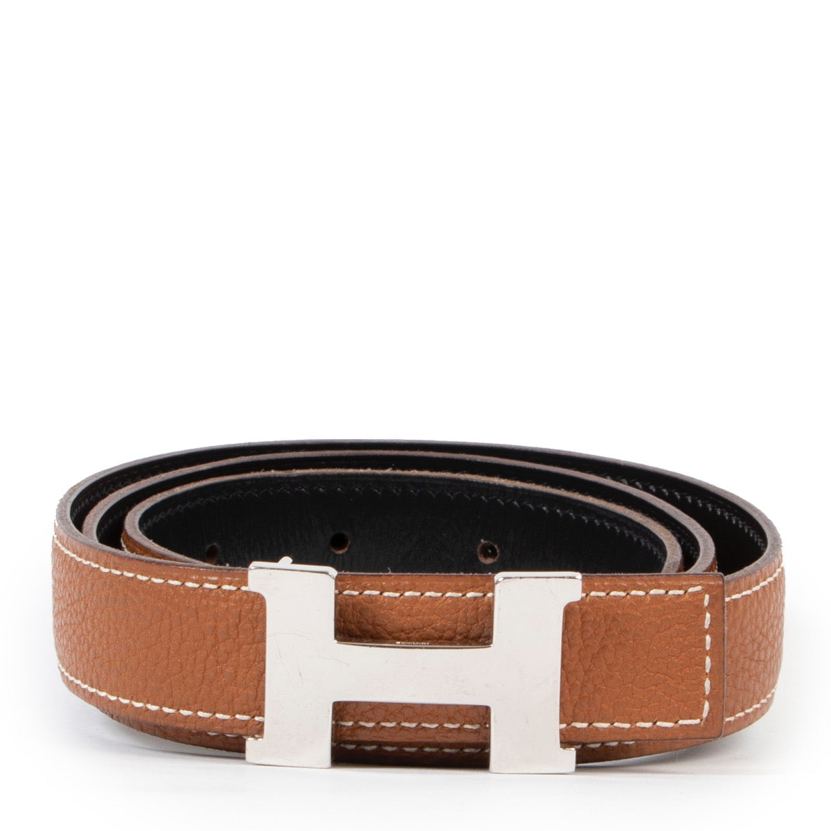 Hermès mini Constance Martelee belt buckle & Reversible leather strap 24 mm is available to be bought at Labellov a luxury secondhand store where you can buy and sell your designer items.