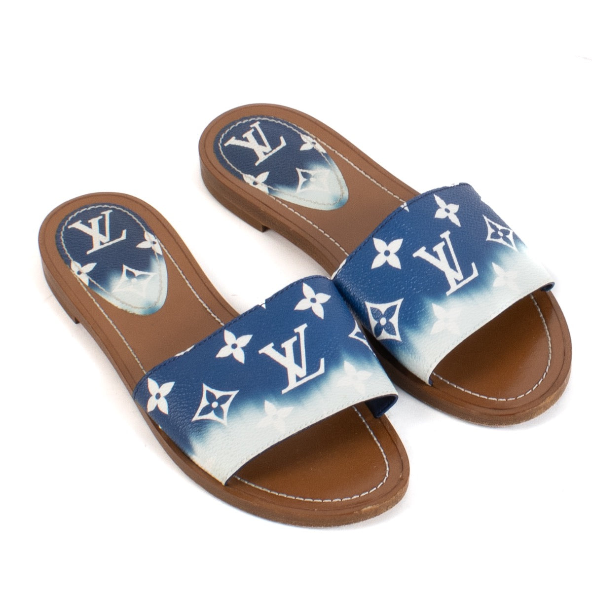 Shop safe online at Labellov in Antwerp, Brussels and knokke this 100% authentic second hand Louis Vuitton Escale Slippers - Size 38