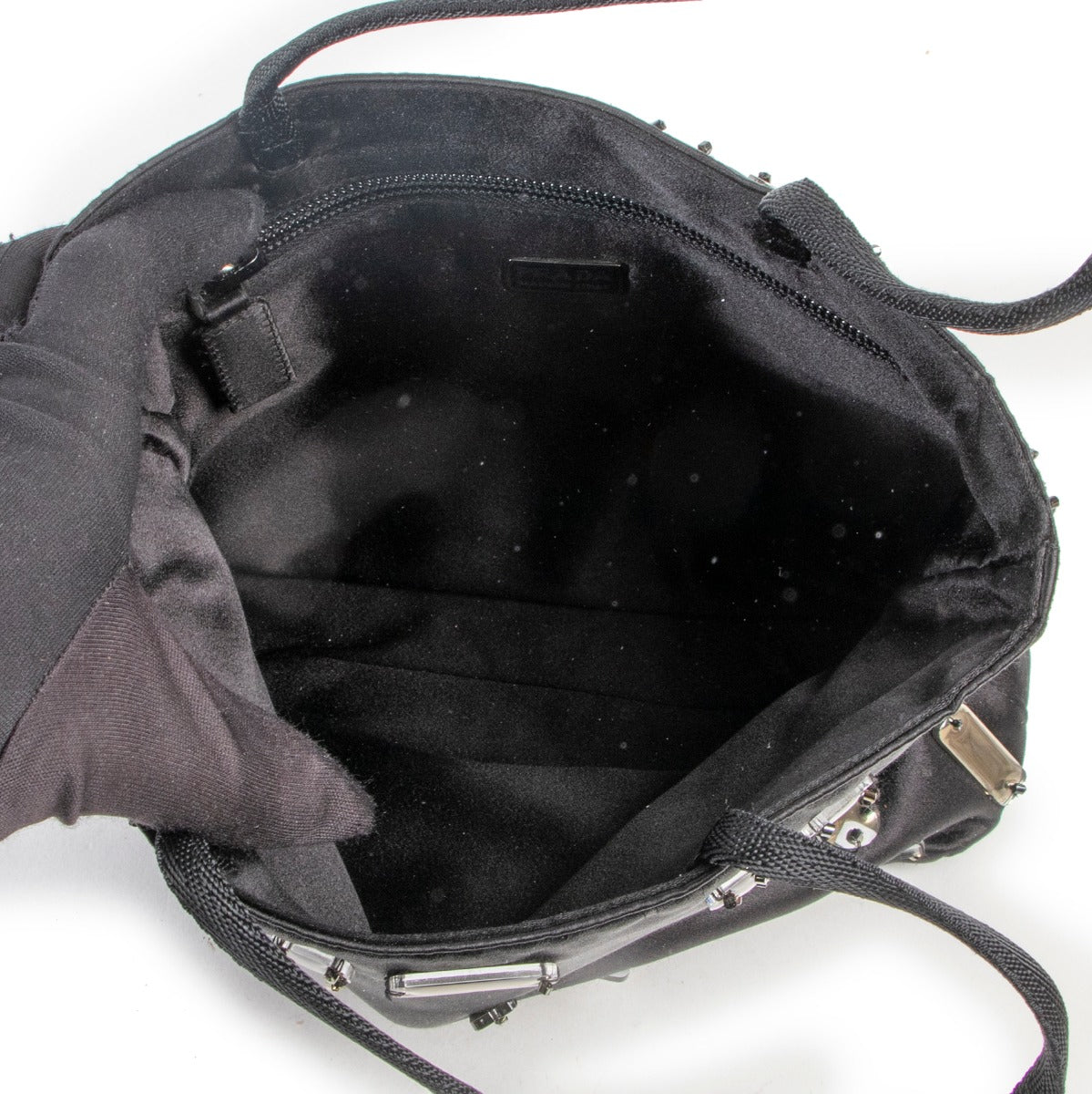 Original black little bag by Prada in vintage shop