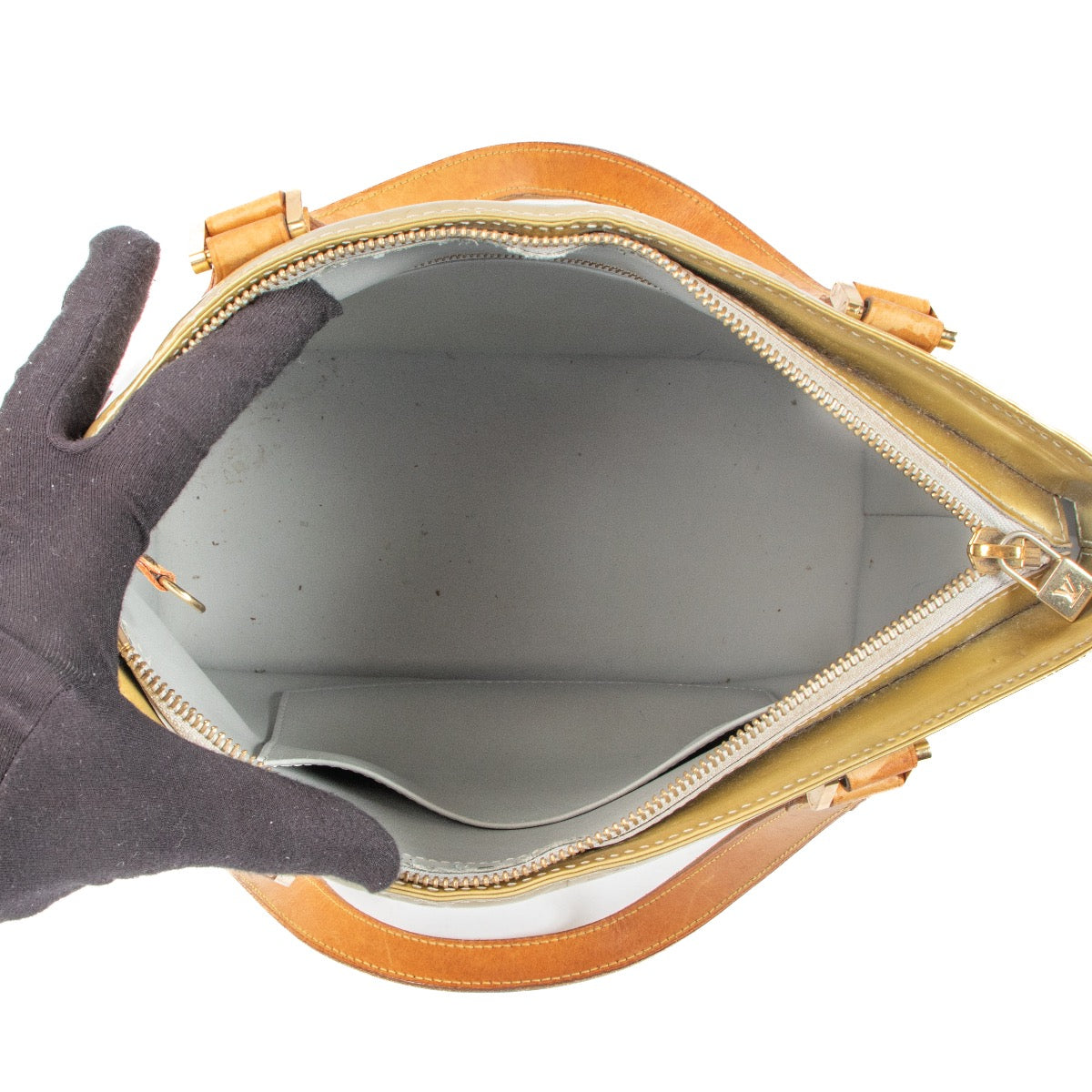 Shop 100% authentic second-hand Louis Vuitton Houston Gold Top Handle on Labellov.com