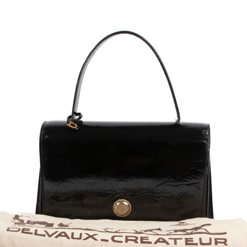 Buy and sell your designer items at Labellov in Antwerp such as this Delvaux Black Patent Leather Top handle for a fair price and in preloved condition.