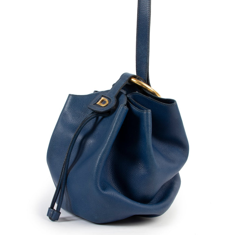 Delvaux Blue Rose des Vents Shoulder Gathered Bucket Bag available at Labellov for a reasonable price online or in store. Bring your designer or Delvaux items to ou showroom in Antwerp and give them a second life.