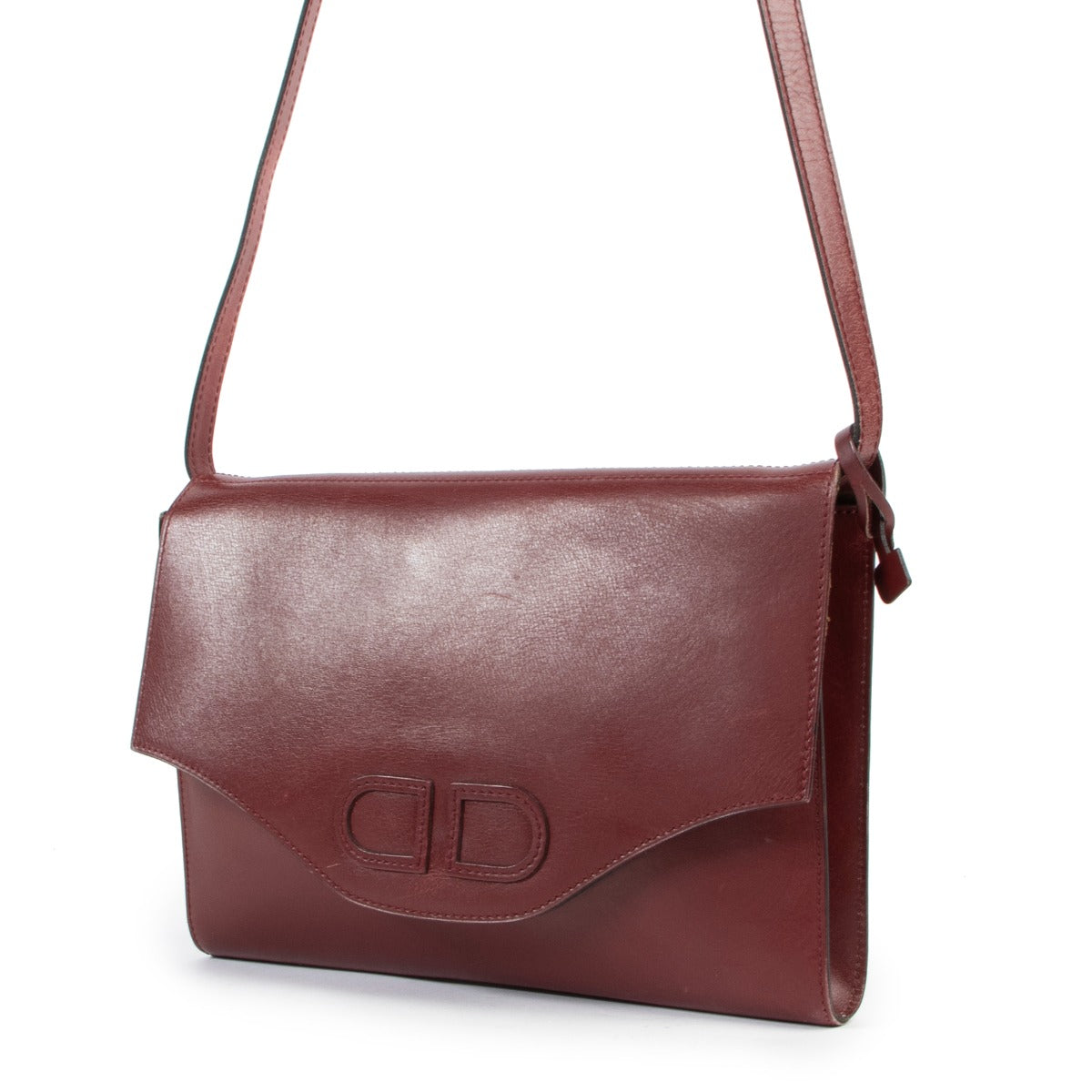 This Delvaux Burgundy Shoulder Flap Bag Clutch is available at Labellov for a fair price online or in store.