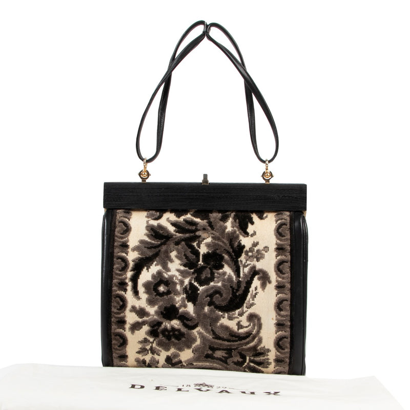 Shop safe online 100% authentic second hand Delvaux Vintage Black and White Top Handle Bag in good preloved condition at the right price at Labellov in Antwerp.