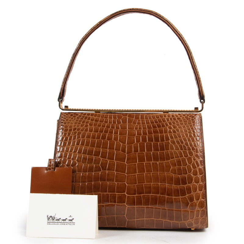 Shop safe online 100% authentic second hand Delvaux Cognac Croco Top Handle in very good condition at Labellov in Antwerp.