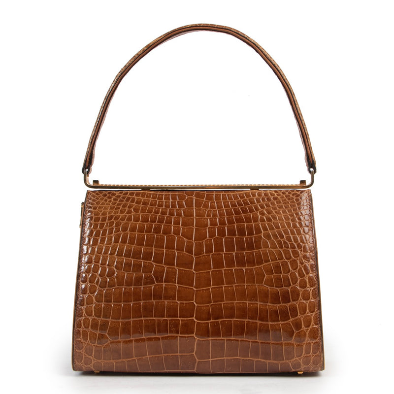 Shop safe online 100% authentic second hand Delvaux Cognac Croco Top Handle in very good condition at Labellov in Antwerp.