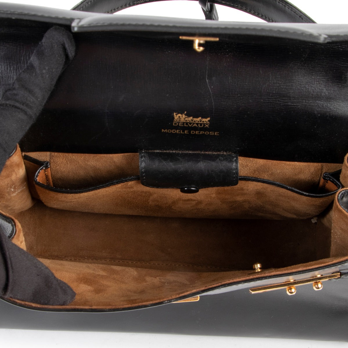 Original no fake Delvaux Tempête Black Leather Top handle in good condition on Labellov vintage site for 2nd hand luxury goods