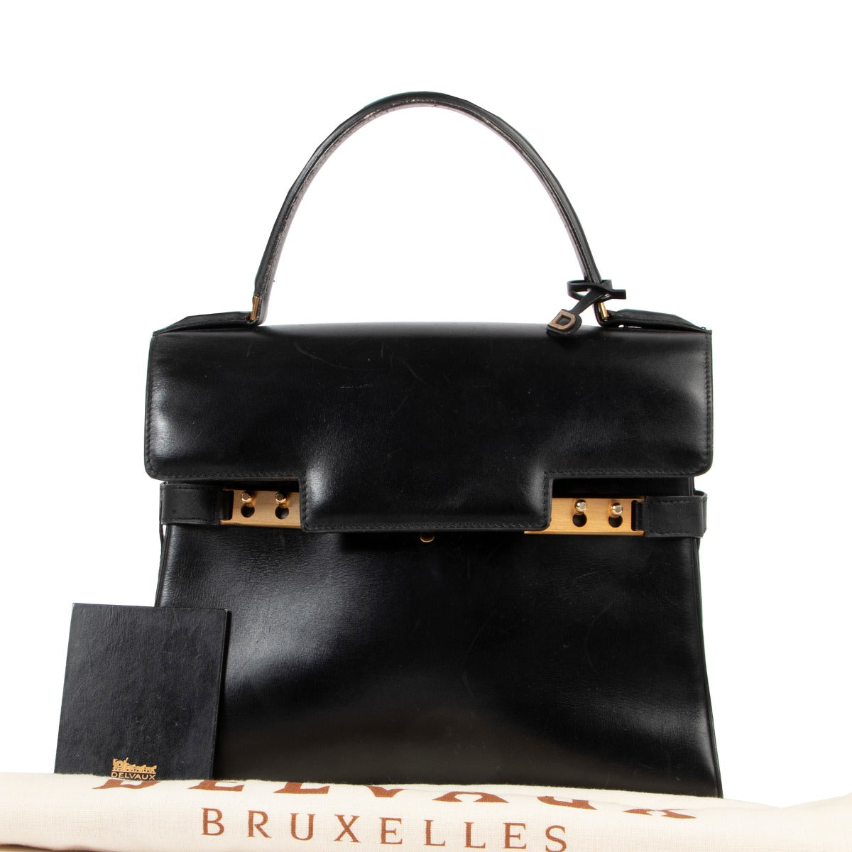Original no fake Delvaux Tempête Black Leather Top handle in good condition on Labellov vintage site for 2nd hand luxury goods