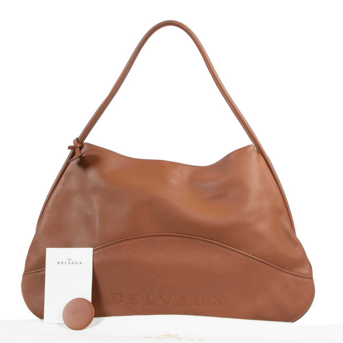 This Delvaux Cognac Lagoon Lady Calf Shoulder Bag is available at Labellov for a reasonable price in very good condition.