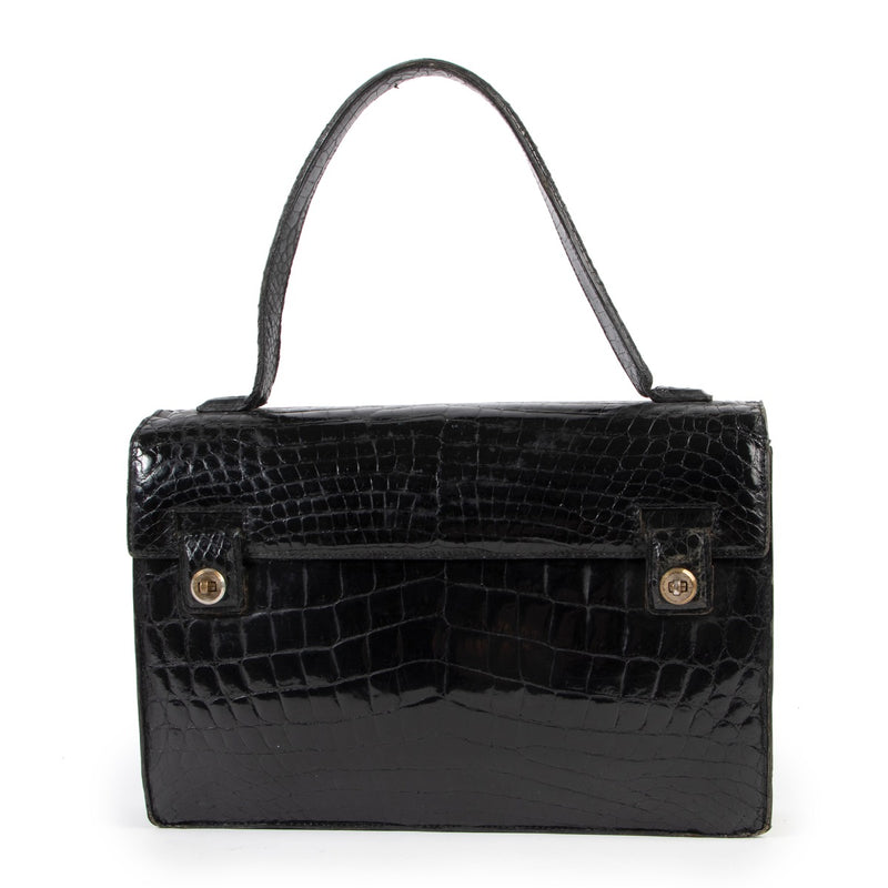 Delvaux Black Croco Vintage Top handle available at Labellov. A true vintage catch for vintage lovers online or in store.