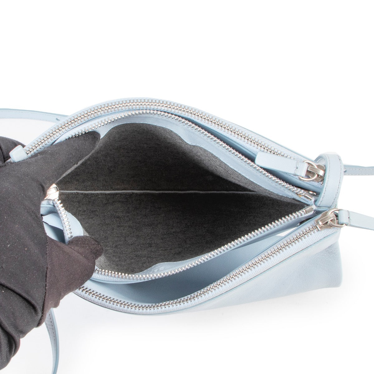 Give this Celine Light Blue Trio Crossbody Bag a secondlife online or in store at Labellov