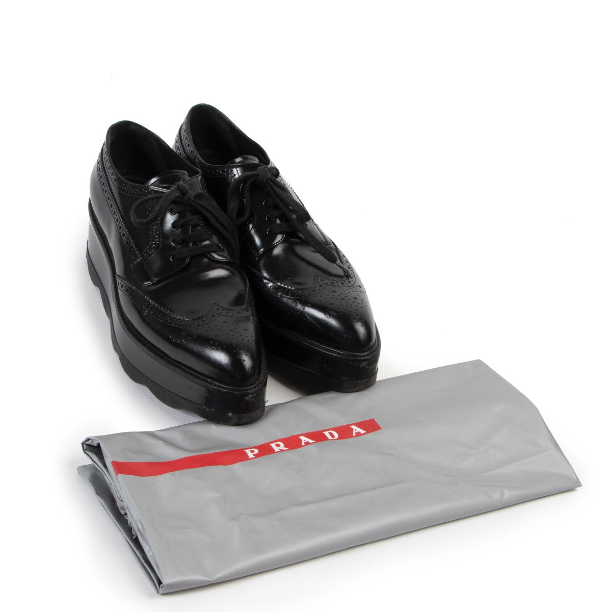 shop safe online at Labellov in Antwerp this 100% authentic second hand Prada Black Platform Brogues - Size 40