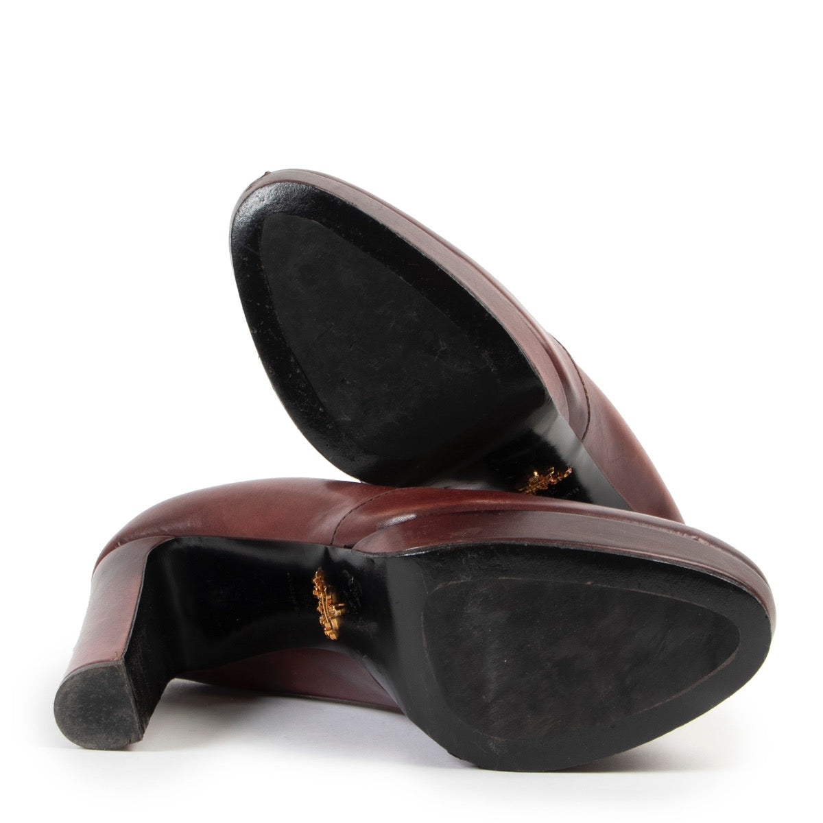 Shop safe online at Labellov in Antwerp this 100% authentic second hand Prada Burgundy Platform Pumps - Size 38