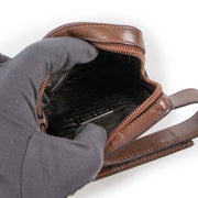 Buy an authentic vintage Prada Brown Leather Wrist Mini Pouch at Labellov Antwerp.