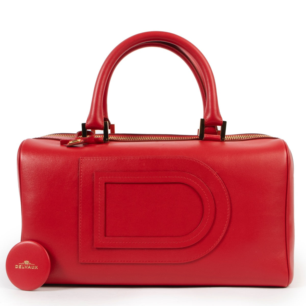Vintage Delvaux Red Louise Boston handle in good condition on Labellov website for 2nd hand designers