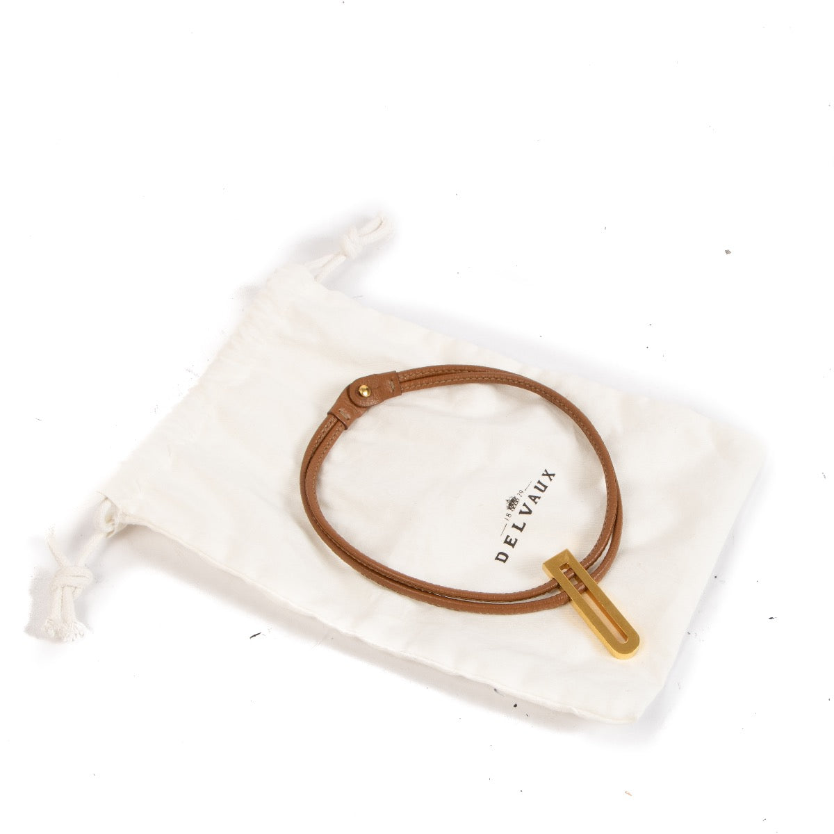 Shop safe online at Labellov in Antwerp, Brussels and Knokke this 100% authentic second hand Delvaux Cognac Leather Necklace