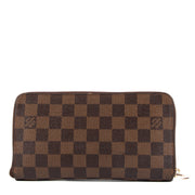 Pre loved Louis Vuitton Zippy Organiser in good condition on Labellov.com