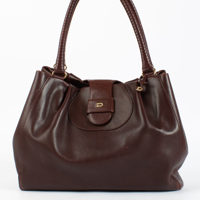 Delvaux Sellier bag in Pinot Clair Obscur Box Calf leather with gold hardware. A structured, elegant Delvaux icon in excellent pre-loved condition.