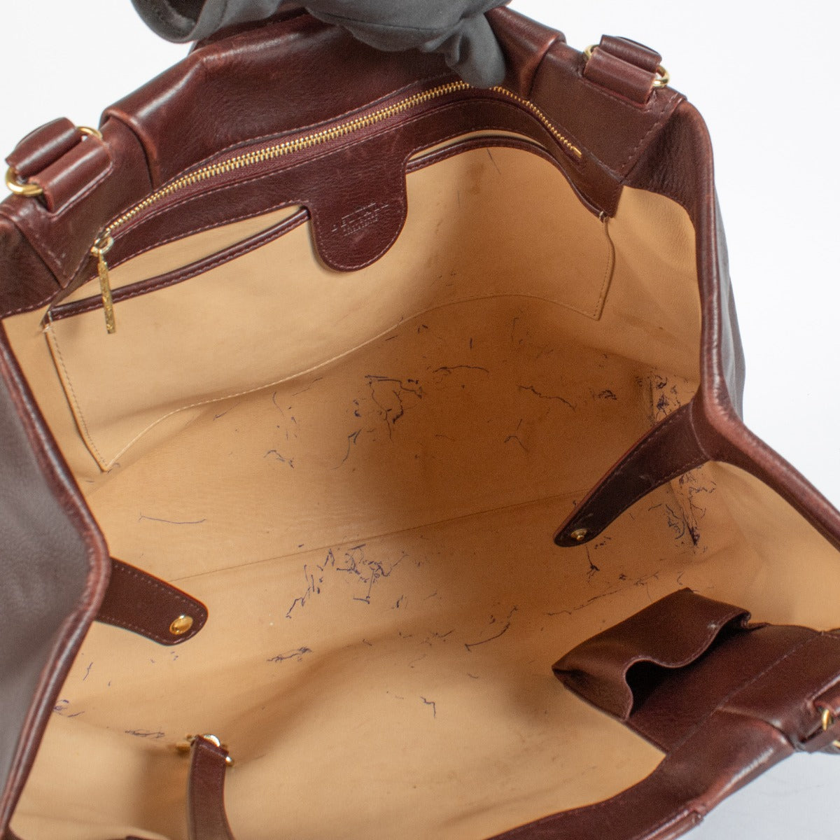 Delvaux Sellier bag in Pinot Clair Obscur Box Calf leather with gold hardware. A structured, elegant Delvaux icon in excellent pre-loved condition.