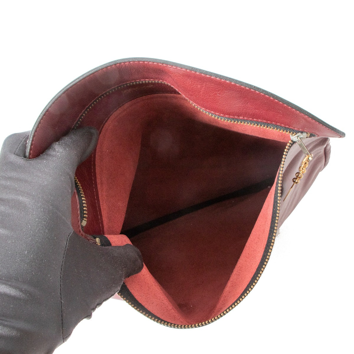Pochette à rabat Delvaux vintage en cuir bordeaux avec pendentif