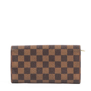 Buy a vintage second-hand Louis Vuitton Damier Ebene Canvas Wallet in very good condition at Labellov in Antwerp.