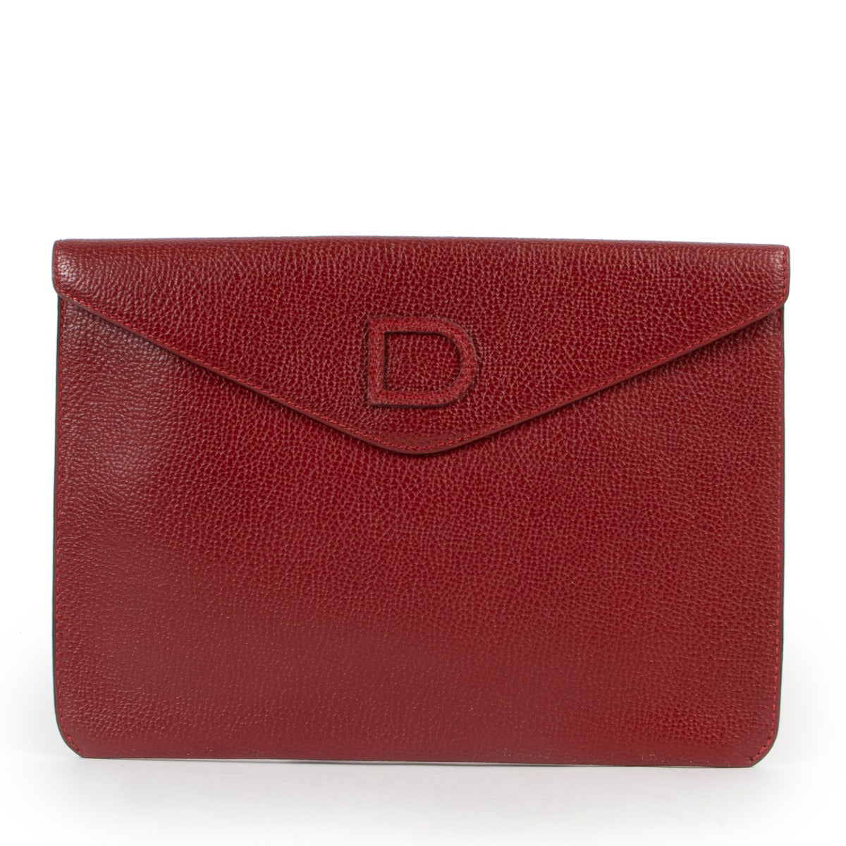 Red leather clutch by Delvaux in good condition
