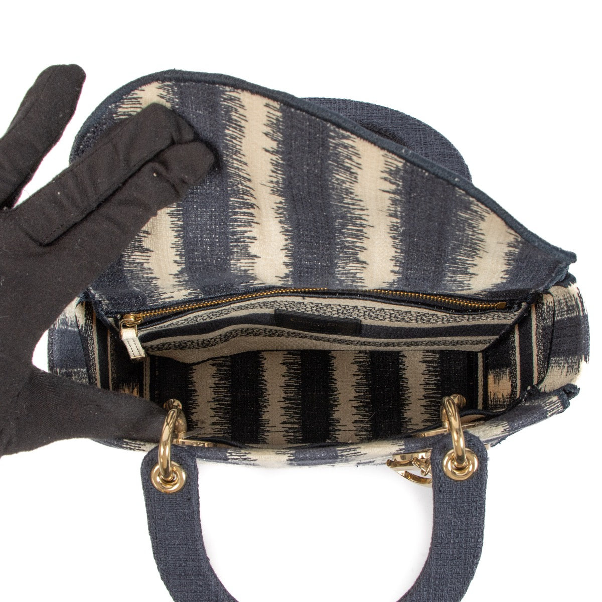 Shop safe online at Labellov in Antwerp, Brussels and Knokke this 100% authentic second hand Christian Dior Blue and Beige Striped Lady D-Lite Top Handle