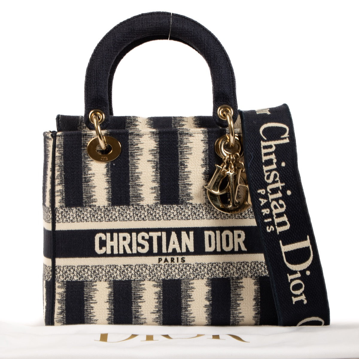 Shop safe online at Labellov in Antwerp, Brussels and Knokke this 100% authentic second hand Christian Dior Blue and Beige Striped Lady D-Lite Top Handle