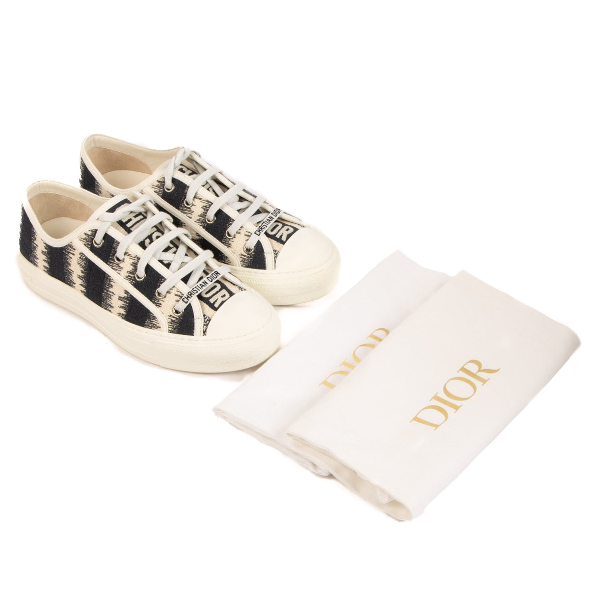 Shop safe online at Labellov these 100% authentic second hand Christian Dior Blue and White Striped Canvas Walk'n' Dior Sneakers - size 38